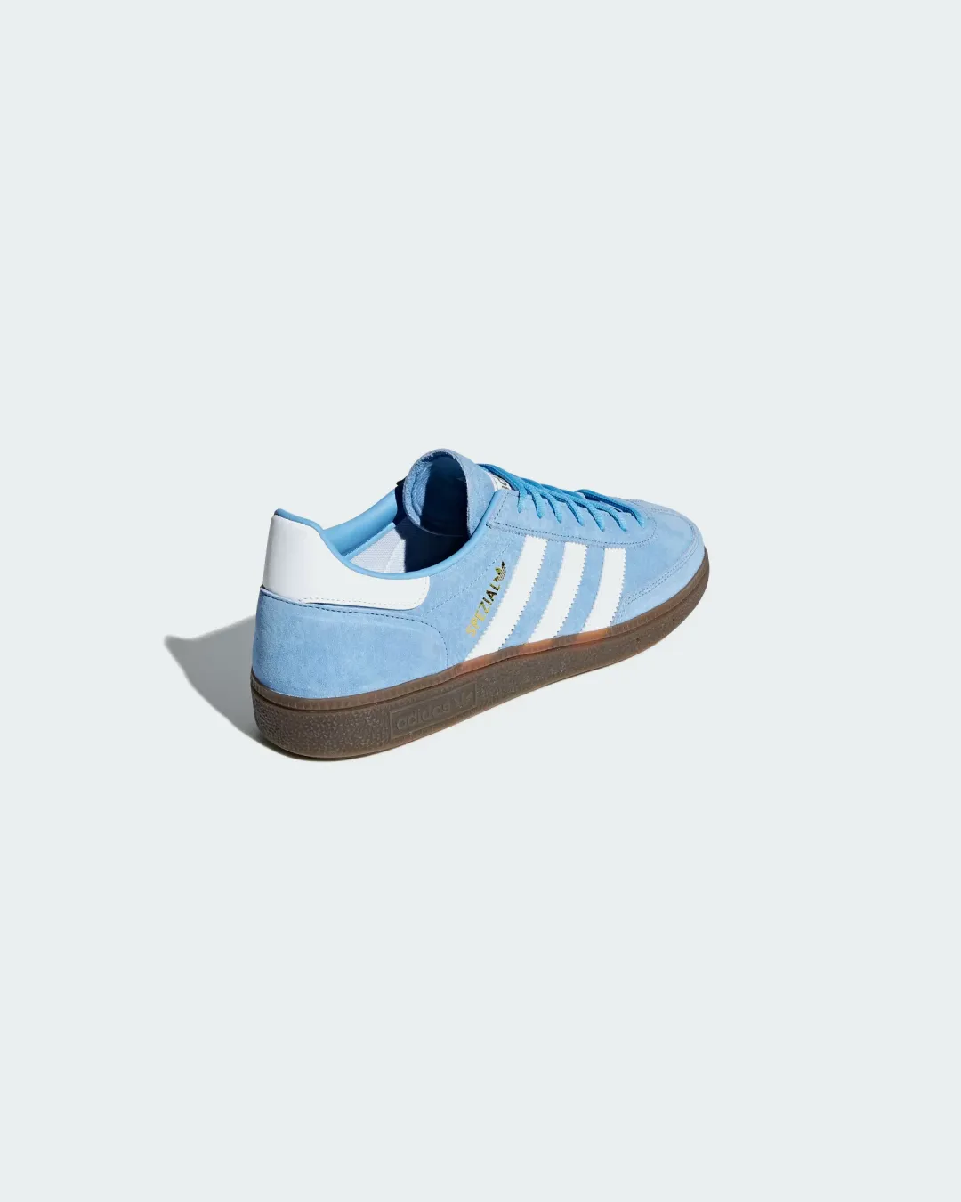 rainy days running in a bus station area shoes Adidas Handball Spezial Light Blue White Gum Sneakers