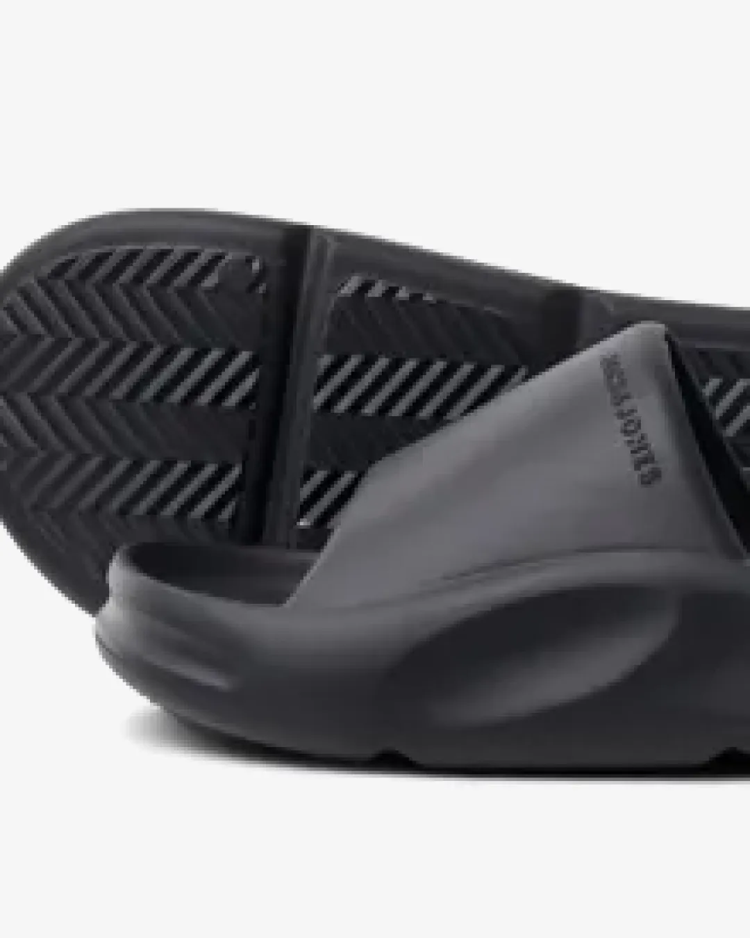 Jack & Jones slides in Navy Blue running in a desert area