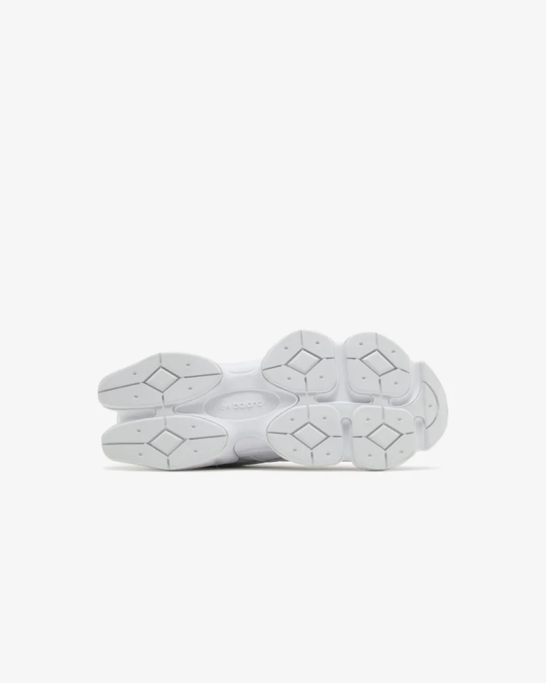 New Balance 9060 ??Triple White?? rocky terrain