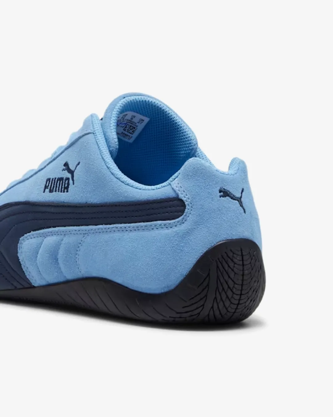 Puma Speedcat Archive Team Blue Sneakers running in a pedestrian path area shoes running in coastal areas