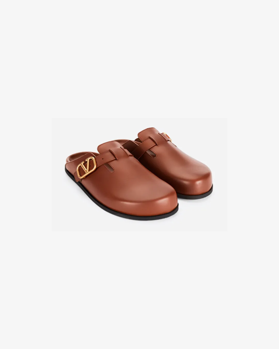 Valentino Garavani V-Logo Sabot Mule in 'Brown' Leather running in a tropical area running for corporate events