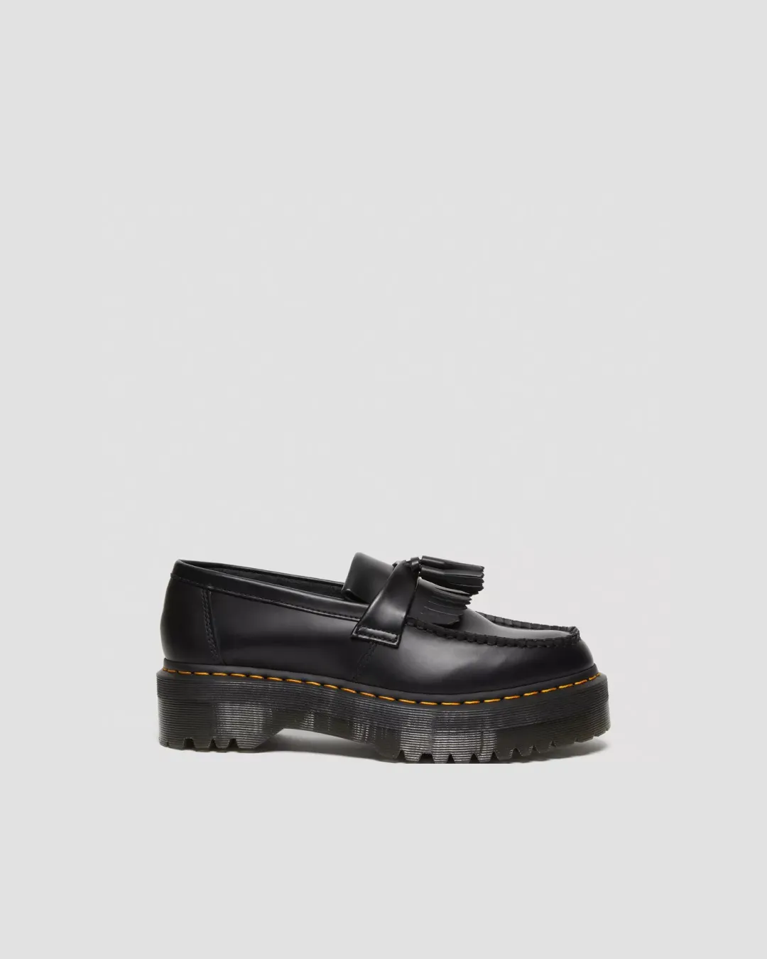 Dr. Martens Adrian Tassel Quad Platform Loafers running for socializing