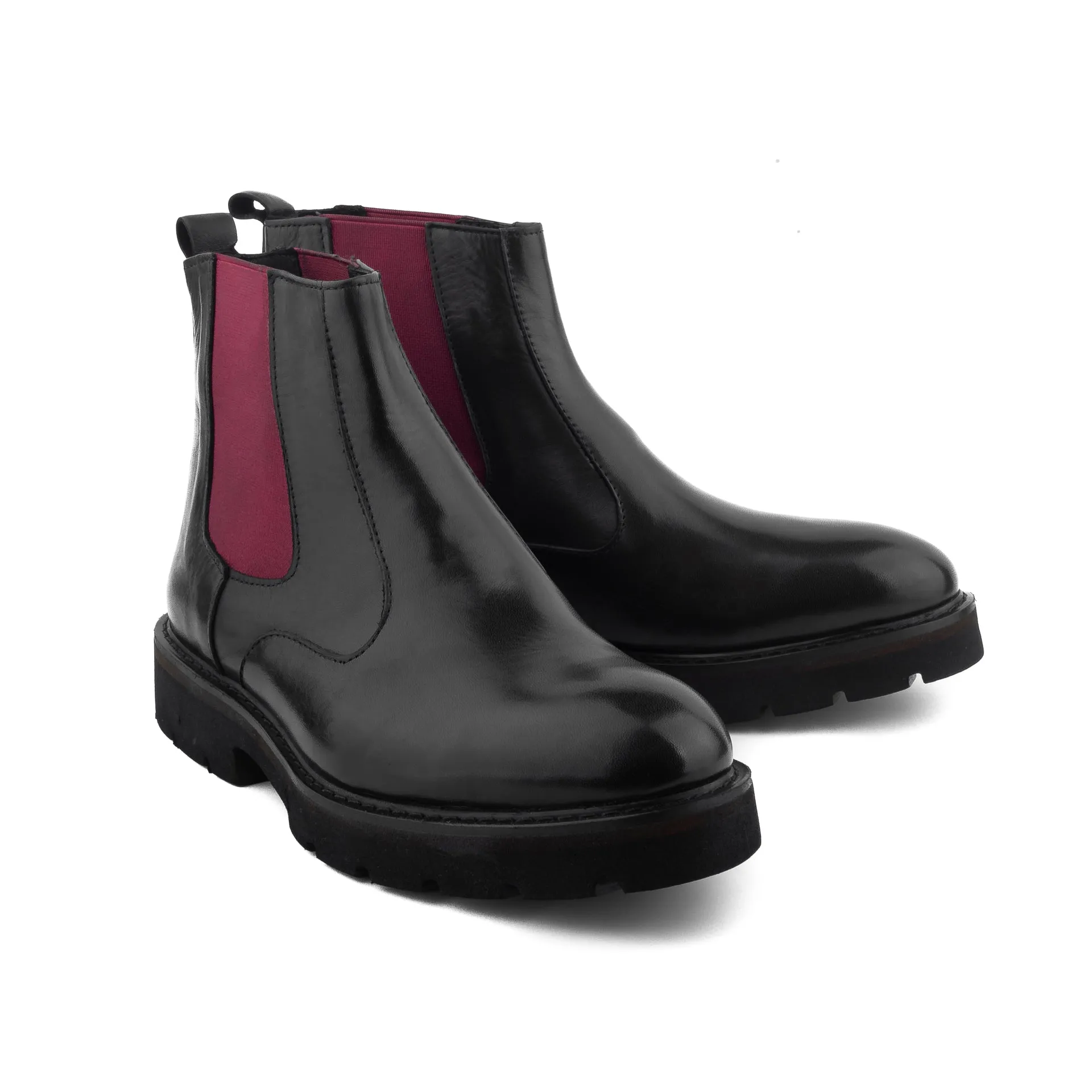 Tam's New Chelsea Boots running in an urban area shoes