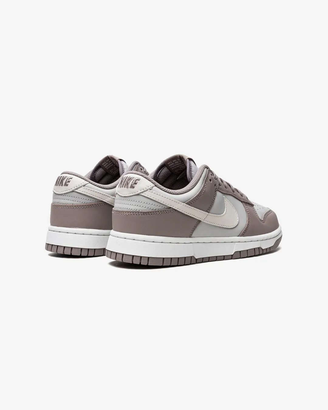 Nike Dunk low Bone Beige Sneakers running on soft surface